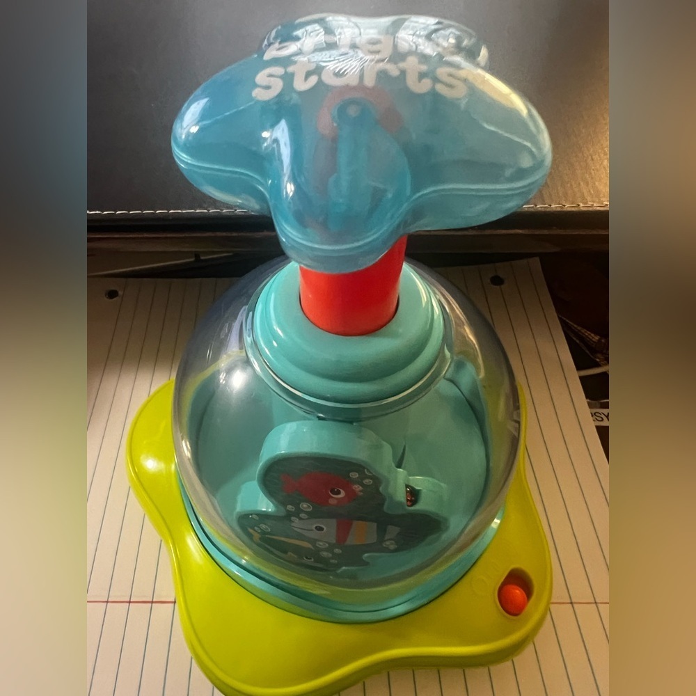 BRIGHT STARS PRESS AND GLOW SPINNER. 
EVERY PUSH MAKES THE STARS GLOW
